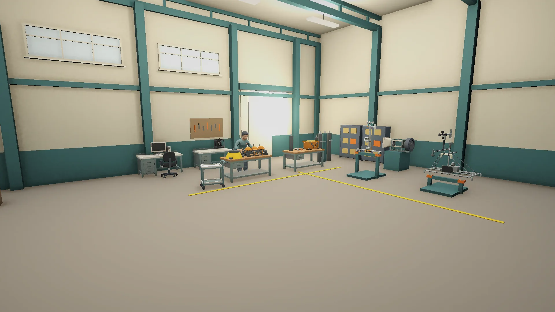 Inside the Sensor Workshop, with instruments on benches and stands, a technician at work and yellow floor markings.